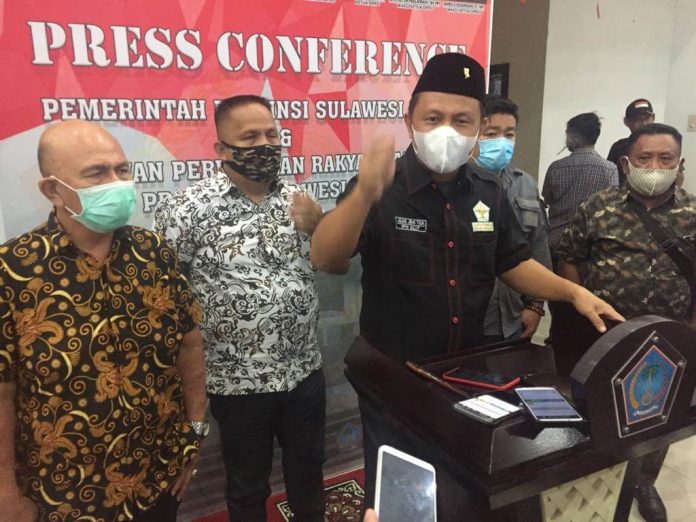 ketua-dpw-apri-sulut-memberikan-keterangan-pers ketua dpw apri sulut memberikan keterangan pers